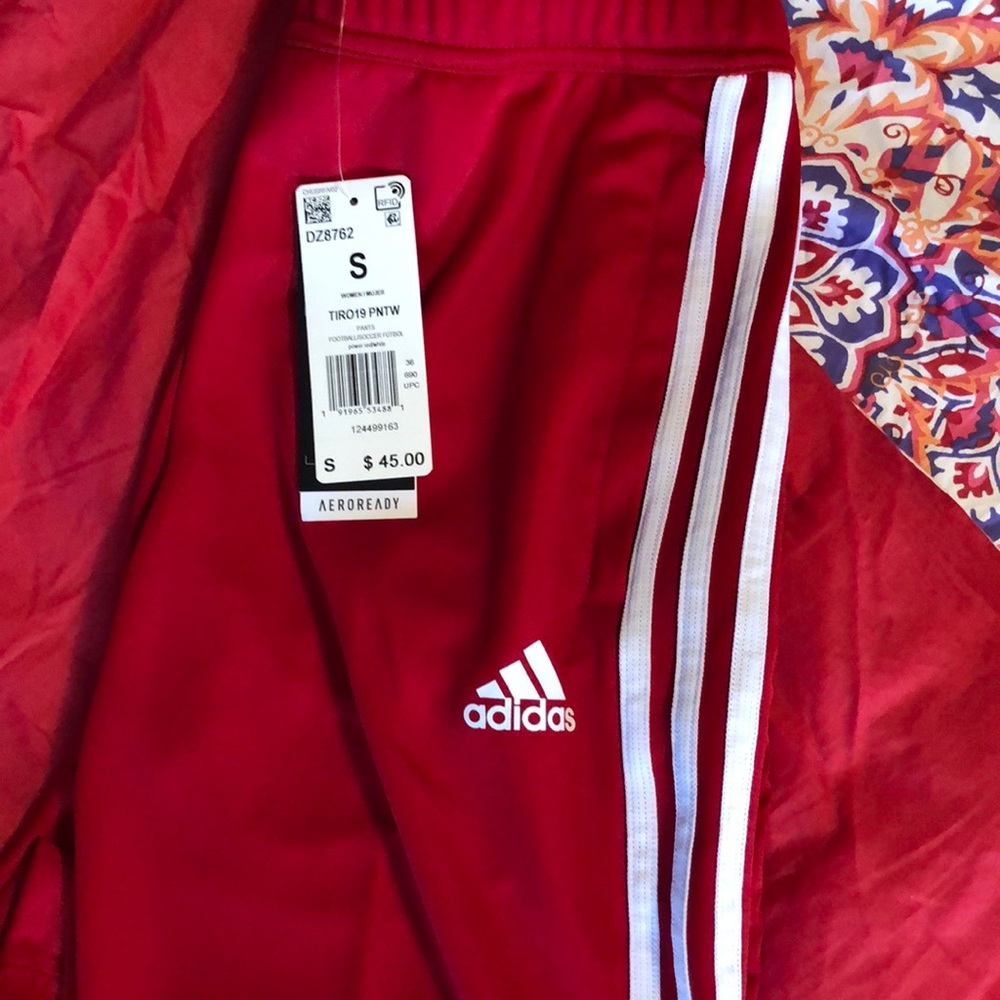 Brand new with tags size small red Adidas